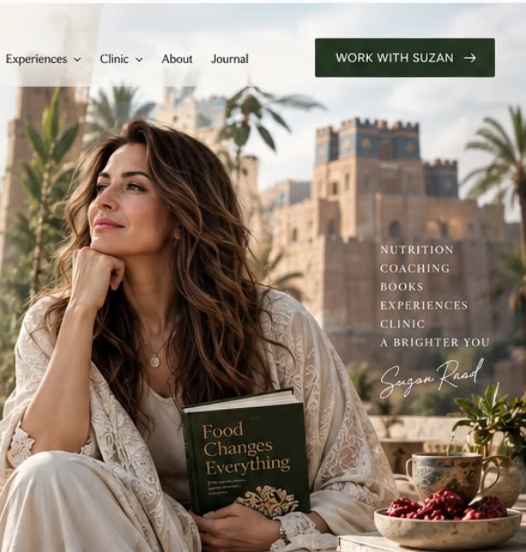 Suzan Raad, nutritionist and author, outdoors with one of her books